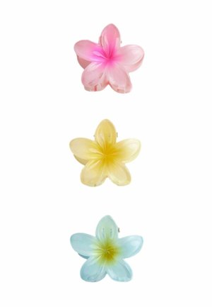 Colorful plastic flower-shaped hair clips in pink, yellow, and blue, each with a glossy finish and four petals, featuring a central accent.
