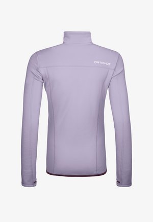 Light lavender long-sleeve pullover with a high neck, featuring flatlock seams and a maroon hem along the bottom and sleeves. Logo on chest.