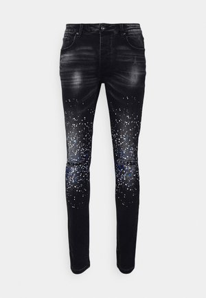 BERLO EXTREME PAINT SPLATTER - Slim fit jeans - black