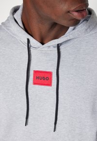 HUGO DARATSCHI - Hoodie - open grey