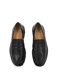 Black leather loafers with a padded upper, round toe, and rubber sole; features a decorative strap across the instep.