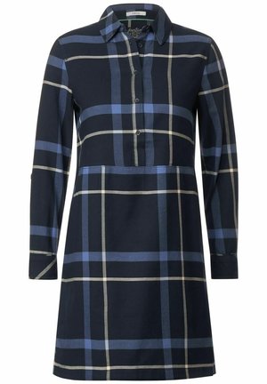 Vestido de mujer de manga larga con cuello y botones delanteros, con un gran diseño de cuadros en azul marino, azul claro y beige.