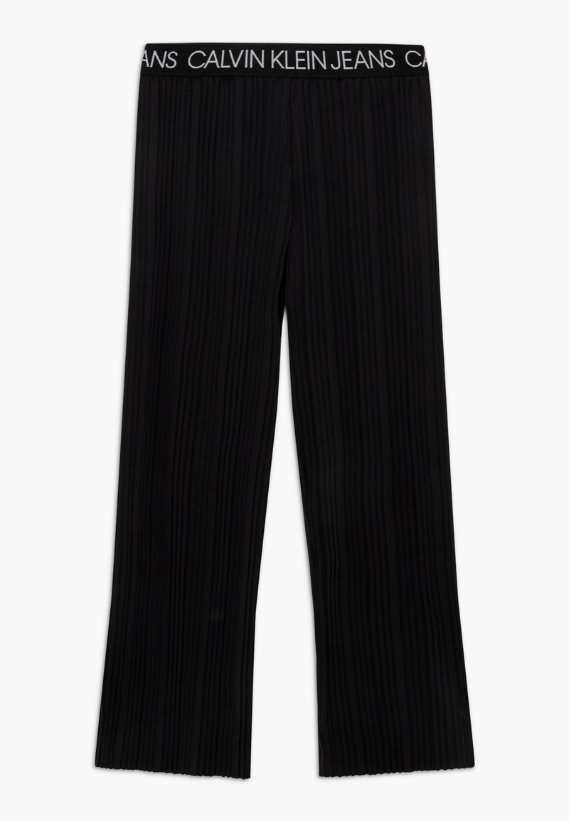 Czarne prążkowane spodnie typu wide-leg z elastycznym pasem, z białym napisem "Calvin Klein Jeans".