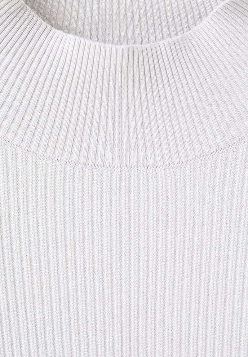 Ribbed, light gray fabric featuring a high, textured neckline. The smooth surface has a soft, fine-knit appearance with consistent stripes.