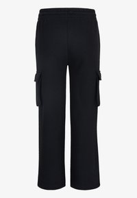 Jordan JORDAN - Pantalones cargo - black