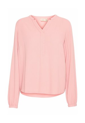 Różowa bluzka z długim rękawem o teksturowanym wzorze, z dekoltem w kształcie litery V i elastycznymi mankietami. Casualowy, luźny krój z asymetrycznym dołem.