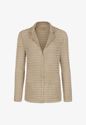 Beige knitted long-sleeve cardigan with three front buttons, two front pockets, and a notched collar in a textured open-weave pattern.