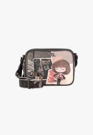 Crossbody bag made of synthetic material in pink and brown, featuring a cartoon design, zipper closure, and decorative charm on strap.