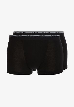 Sorte boxer briefs lavet af blødt stof med en grå elastisk talje, der har "JOCKEY" logoet trykt hen over fronten.