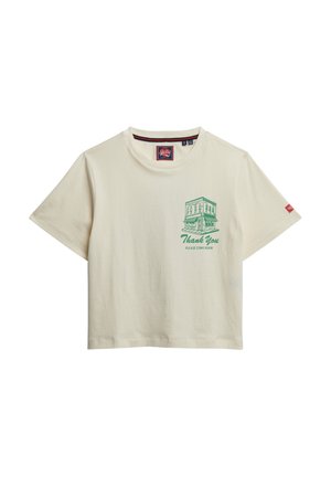 Cremefarbiges Baumwoll-T-Shirt mit lockerem Schnitt. Mit einem grünen Grafikdruck eines Gebäudes und dem Text "Danke, kommen Sie bitte wieder." Kurze Ärmel.