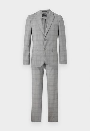 Completo grigio con un motivo a scacchi, design monopetto, rever a taglio, due bottoni e pantaloni dritti con tasche laterali.