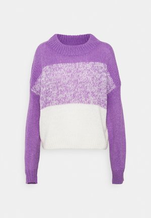 Knitted sweater with a purple and white color block design, featuring a rounded neckline and long sleeves with ribbed cuffs.