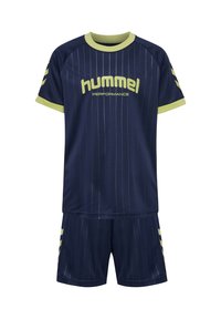 Marinblå sportkläder av mjukt tyg med vertikala ränder, limegröna detaljer och "hummel"-märke på tröjan.