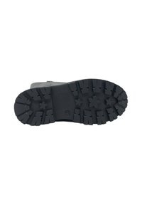 Sole in gomma nera con un motivo di tacco robusto, caratterizzato da scanalature profonde e chiodi a forma di stella per una maggiore aderenza e durata.