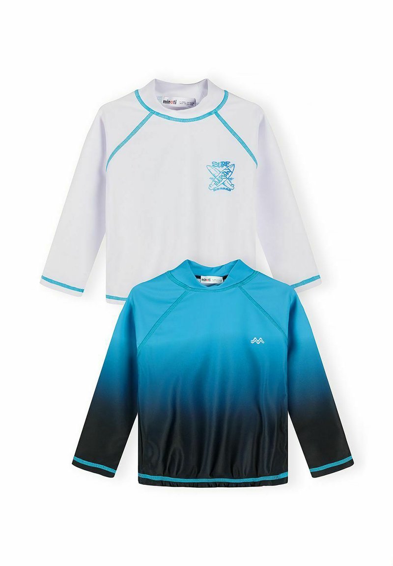 Deux maillots de bain à manches longues pour enfants : un blanc avec un bord bleu et un logo de surf, un autre dégradé du bleu au noir avec un petit symbole de vague.