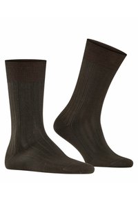 Calcetines de color marrón oscuro y acanalados con un puño elástico de color sólido y una textura suave. Presentan un patrón vertical consistente en toda su superficie.