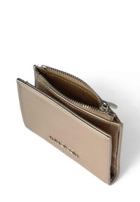 Metallic gold cardholder wallet featuring a zippered compartment, smooth texture, and embossed branding on the front. Compact design.