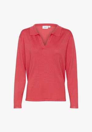 Korallivärvi pikad varrukad, V-kaelusega ja volditud kraega pluus. Valmistatud kergest kangast, has subtile lõige ja õrn tekstuur.