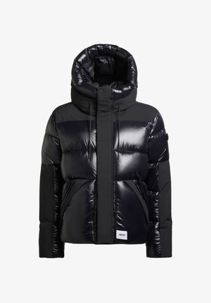 Black puffer jacket featuring a shiny finish, oversized hood, zip closure, and two front pockets with a quilted design.