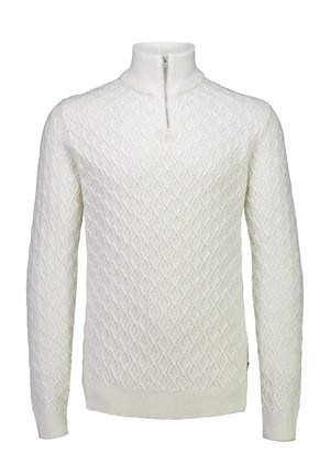 Vit stickad tröja med hög krage, med ett diamantmönster, ribbade muddar och nederkant. Dragkedjestängning vid halsen för justerbar passform.