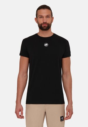 Zwarte T-shirt met korte mouwen van katoen, voorzien van een ronde halslijn en een klein wit rond logo op de borst.