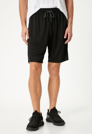 Pantalones deportivos - black