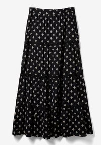Jupe maxi noire à volants avec un motif en diamant crème, en tissu texturé et dotée d'une taille élastique. Agrémentée d'accents en dentelle.