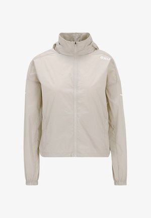 Helebeige lühike jakk, mis on valmistatud kergest materjalist, kõrge kaelusega, lukuga kinnitatud ja elastsete mansettidega. Esiosas brändi logo.