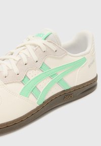 ASICS SportStyle SKYHAND OG UNISEX - Tenisice - cream/menthol