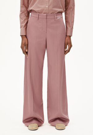 Wide-leg trousers in soft pink fabric with a smooth texture, featuring a tailored waistband, front pleats, and side pockets.