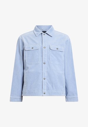 Helles blaues Cord-Jackett mit spitzem Kragen, zwei Fronttaschen und metallenen Druckknöpfen. Strukturierter, gerippter Stoff mit geradem Schnitt.