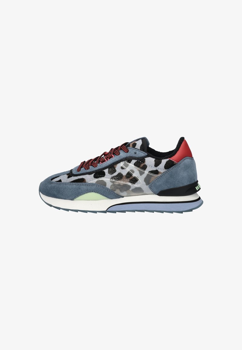 Sneakers feature a mix of gray suede and a leopard print upper, red accents, and textured black collar. Green detail on midsole.