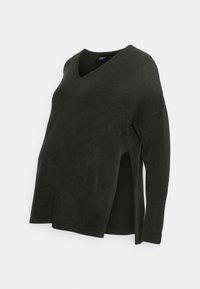 Svart v-ringad tröja med långa ärmar, sidoklaffar, tillverkad av mjukt stickat material, med en avslappnad passform och slät textur.