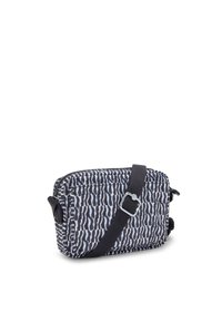 Kompakt crossbody-väska tillverkad av mönstrad tyg i svart och vitt. Har dragkedjestängning och justerbar rem för bekvämlighet.