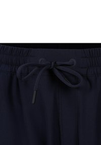 Wilson ACTION WARM-UP - Jogginghose - dunkelblau