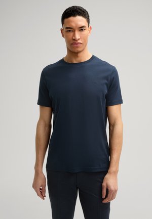 Navyblauwe katoenen t-shirt met een ronde hals en korte mouwen. Heeft een klein geborduurd logo op de borst en een gladde textuur.