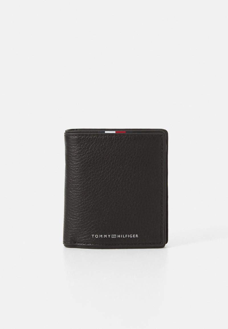 Black leather wallet with a textured finish, bi-fold design, and visible branding. Features a color accent in red, white, and blue.