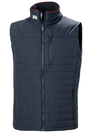 Námorní vestový kabát s vysokým límcem, předním zipem a dvěma bočními kapsami se zipem. Má červené akcenty na límci.