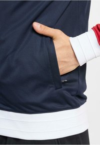 UNFAIR ATHLETICS Bluză de molton cu fermoar - red