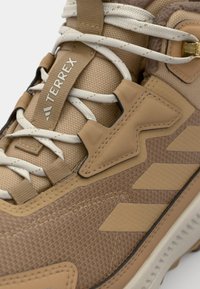 Adidas Terrex ANYLANDER CLIMAWARM - Vinterstövlar - cardboard/earth strata