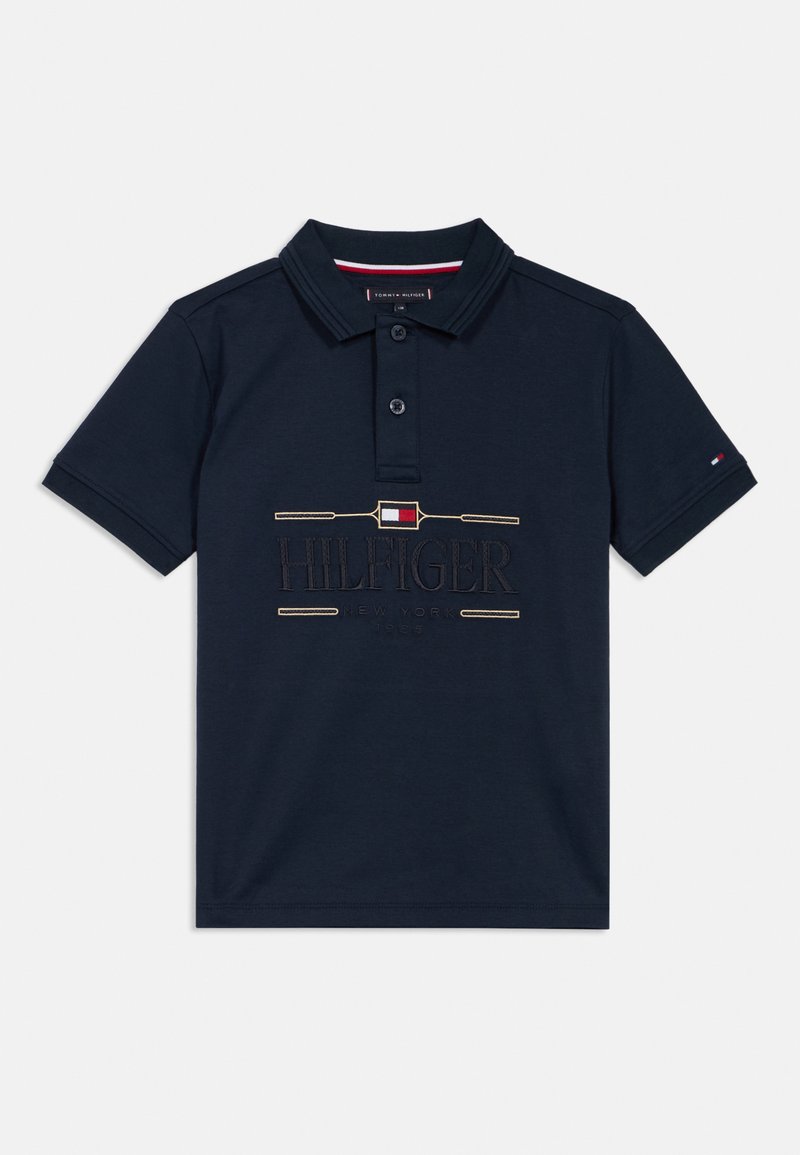 Námornícky polo tričko s golierom, ktoré má vyšívané logo "HILFIGER" a akcenty v červenej, bielej a zlatej. Mäkká bavlnená tkanina.