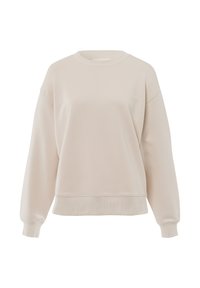 Felpa crema con maniche lunghe, polsini e scollo a coste, vestibilità ampia, texture liscia e orlo a costine. Senza loghi o motivi visibili.