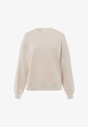 Sudadera cremosa con mangas largas, puños y cuello acanalados, corte holgado, textura suave y dobladillo elástico. Sin logotipos ni patrones visibles.