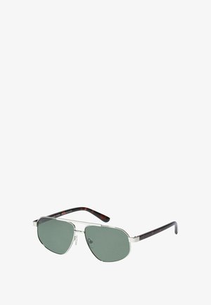 Metal sunglasses with green lenses, a silver frame, and tortoiseshell-patterned temples. Features a sleek design and adjustable nose pads.