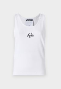 Valkoinen ribattupaita, jossa on keskellä musta brodeerattu kuvio, logo ja ristikkäiset elementit, pyöreä kaula-aukko ja normaali istuvuus.