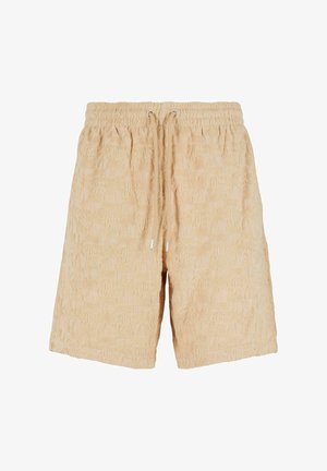 Beige mustrilõngad, millel on tekstuuriga pind, elastne vöökoht ja nööriga sulgemine. Sellel on üle kogu pinda peen logodisain.