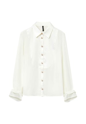 Blusa bianca a maniche lunghe con polsini arricciati, bottoni con accenti di perla lungo la parte anteriore, colletto a punta e una finitura liscia e satinata.