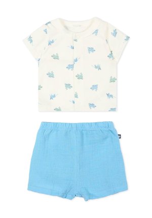 T-shirt bébé blanc à manches courtes avec imprimés de dinosaures bleus et verts, associé à un short bleu clair à taille élastique.