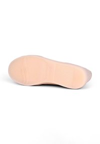 Schuhsohle aus leichtem pinken Gummi mit strukturierter Oberfläche, runder Form und gemusterter Griffigkeit für besseren Halt.
