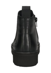 Black leather ankle boot with a smooth texture, rear zipper closure, and a reinforced pull tab. Flat black rubber sole with minimal detailing.
